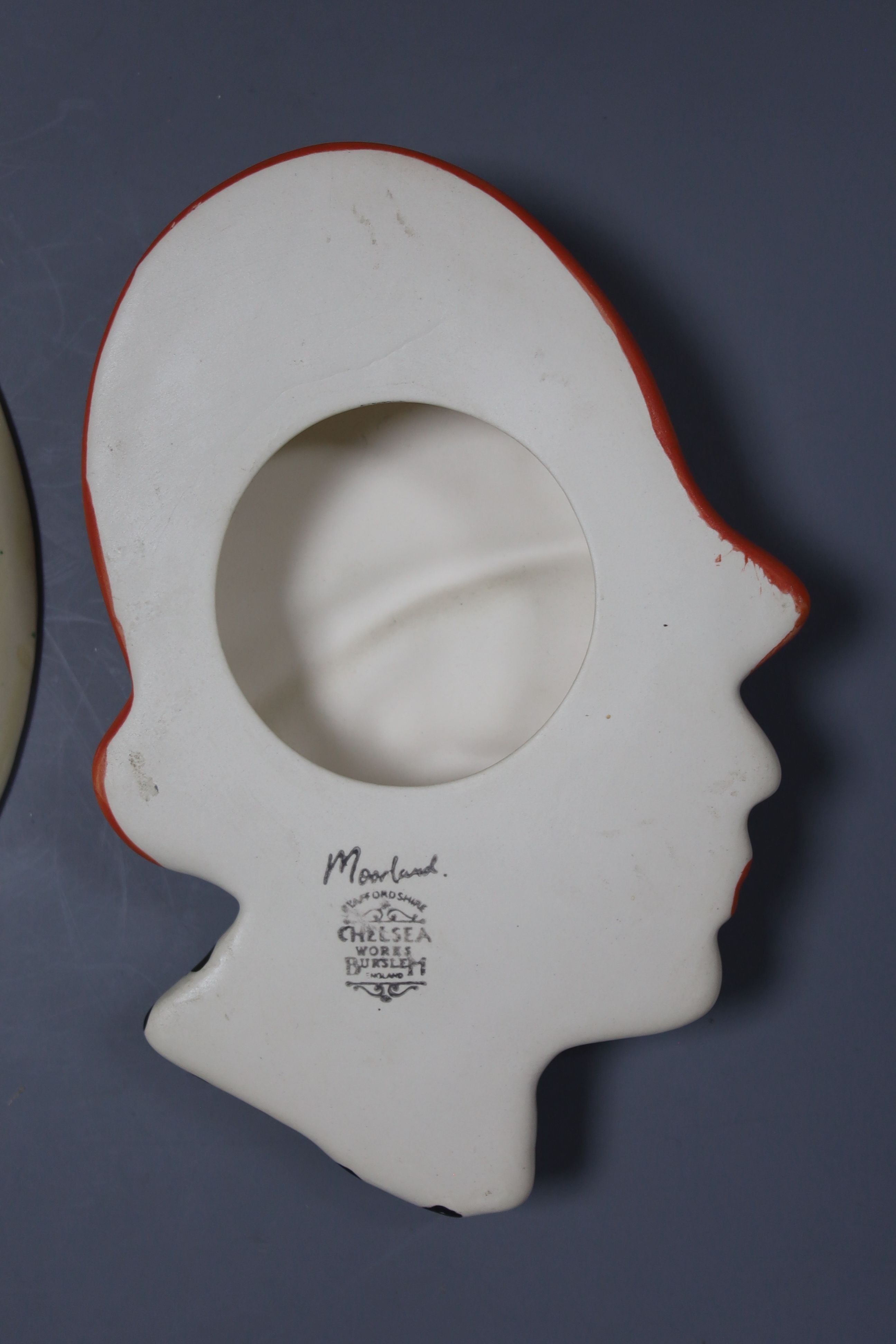 An Art Deco style jug and vase, wall mask and Crown Devon dish